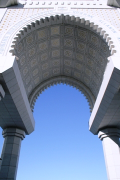 This photo of the Gateway Arch to the family mausoleum of the late President for Life (Saparmurat Niyazov - Father of the Turkmen) of Turkmenistan located just outside Ashkhabad was taken by Ian Beeby of Matlock, UK.  The Archway is made of white marble and is inlaid with gold.